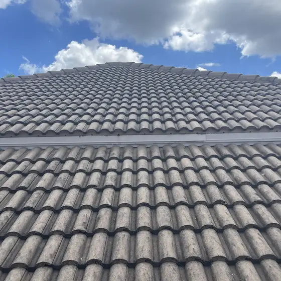 Concrete tile roof under a blue sky