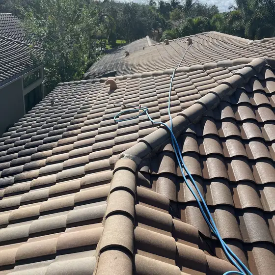 Barrel tile roof with the hose run along the ridge